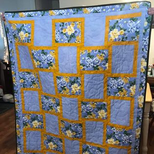 Quilt- Blue and yellow size 42" X 54 1/2"